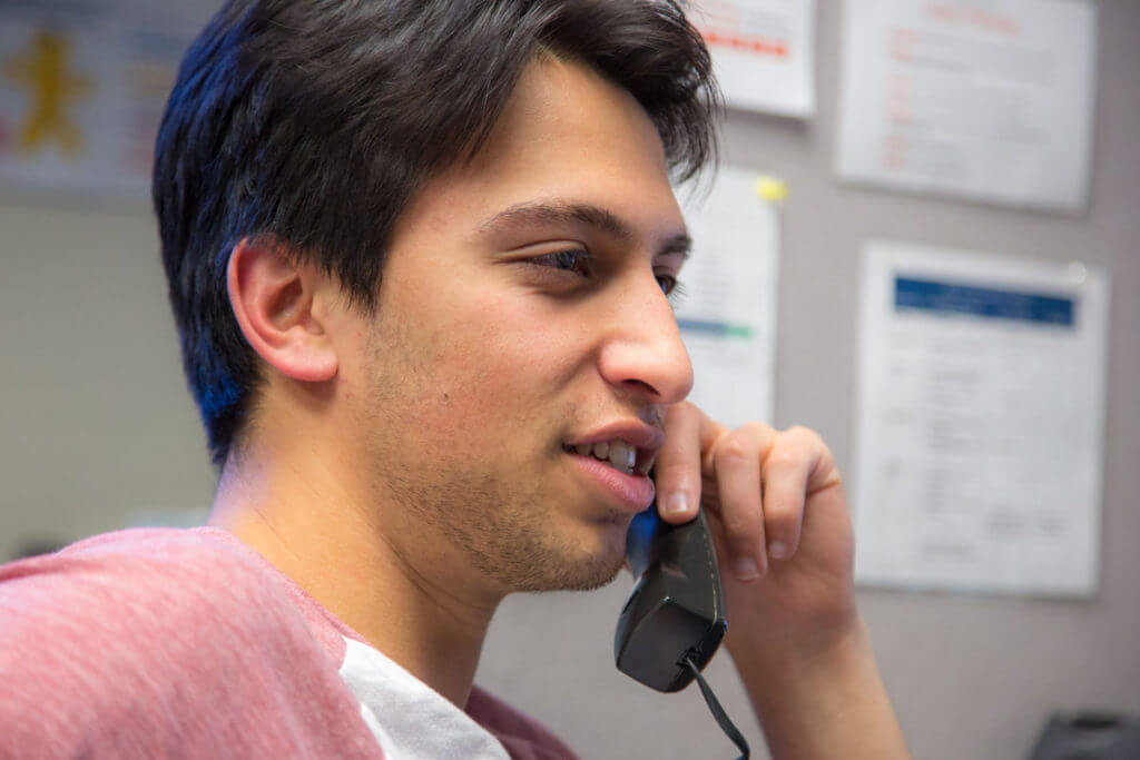 A man talking on the phone.