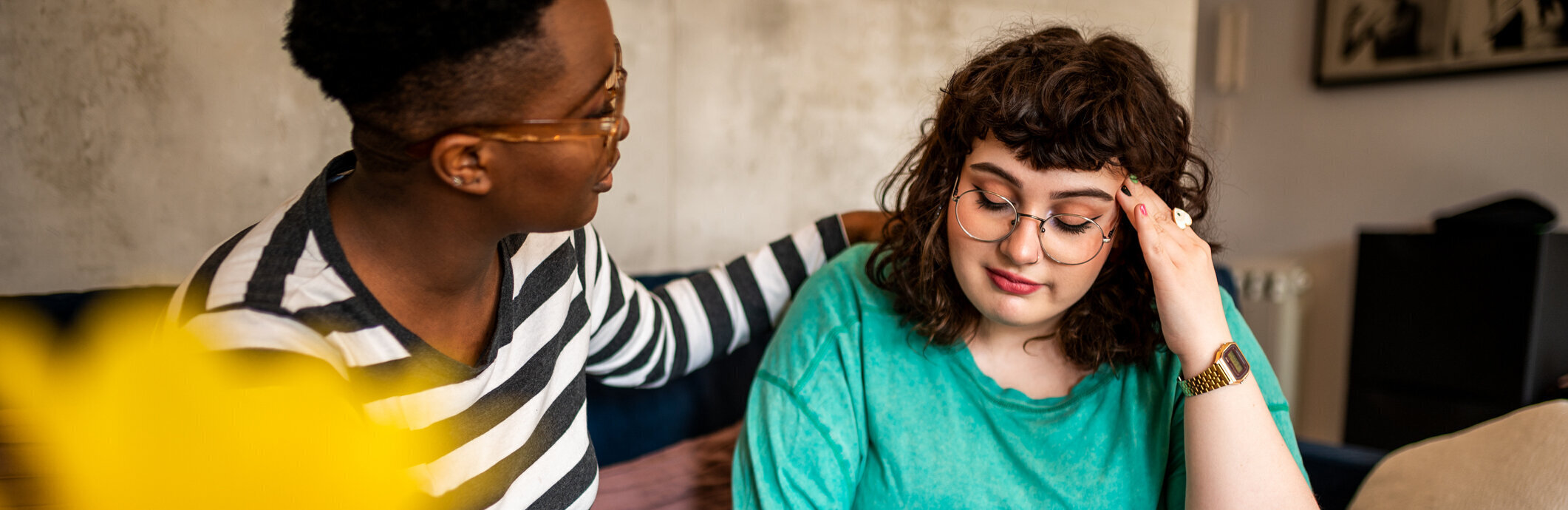 A woman comforting her suicidal friend