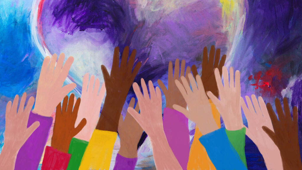 Raised hands and heart-shaped acrylic painting